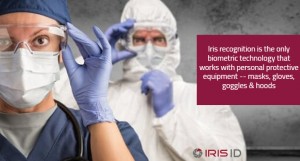 Two doctors wearing masks, gloves, goggles and hoods