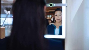 Women uses iris recognition at airport